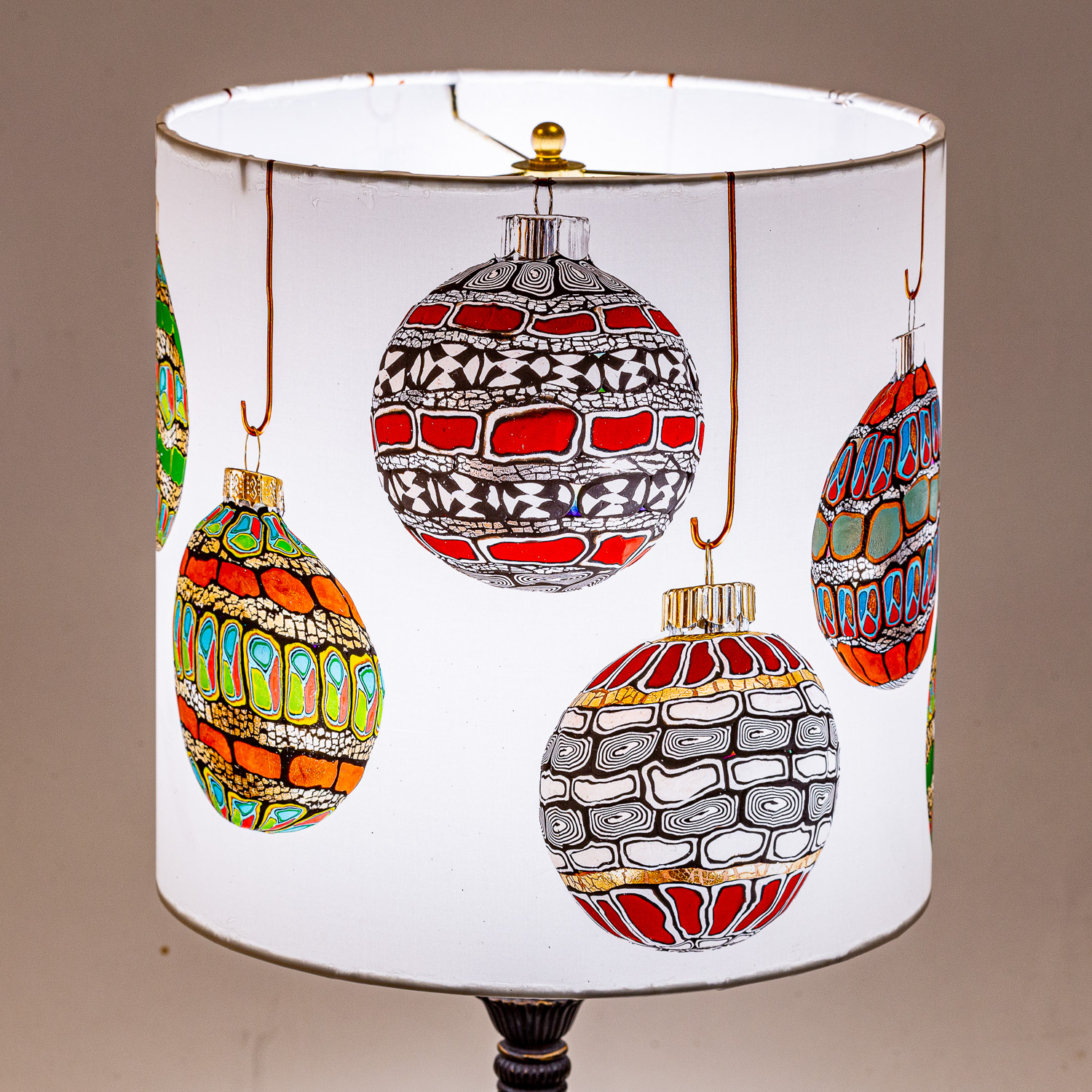 148: Pollymer clay Christmas balls by Janet Elmore -- Photo on Lamp shade by David Elmore